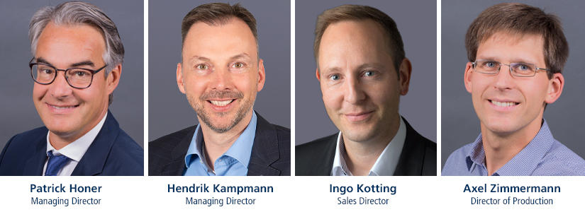 The gentlemen of the NOVA management smile into the camera, Mr. Honer, Mr. Kampmann, Mr. Kotting and Mr. Zimmermann.